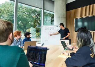 Photograph of BHW conference room and team.