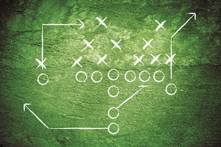 football play chalk on grass - business process metaphor