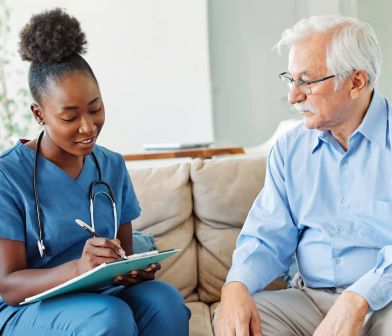 Photograph of doctor and patient.
